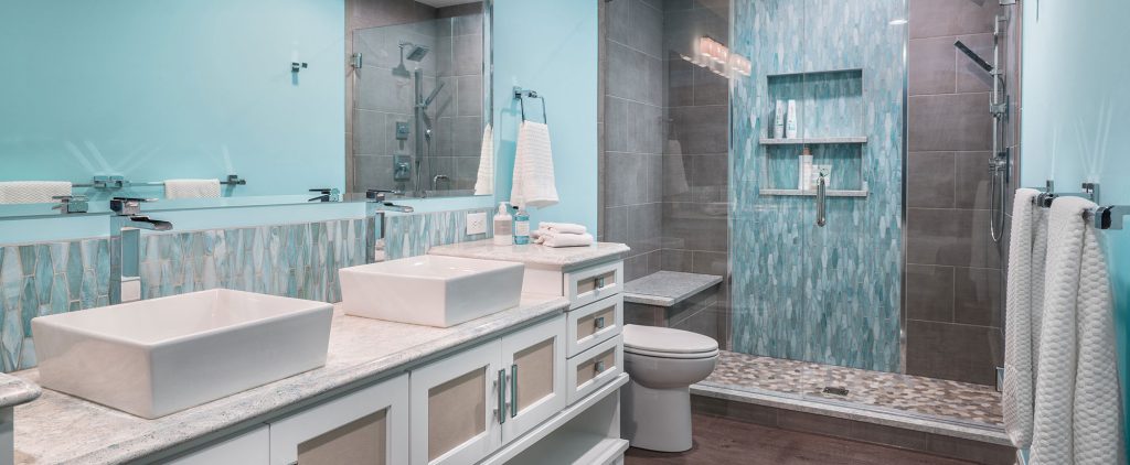 Cleary Company Bathroom Remodels, photo of an updated bathroom with white cabinets and aqua accents