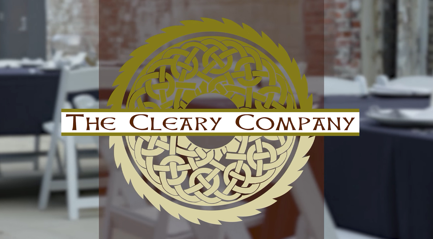 The Cleary Company Logo over party table background