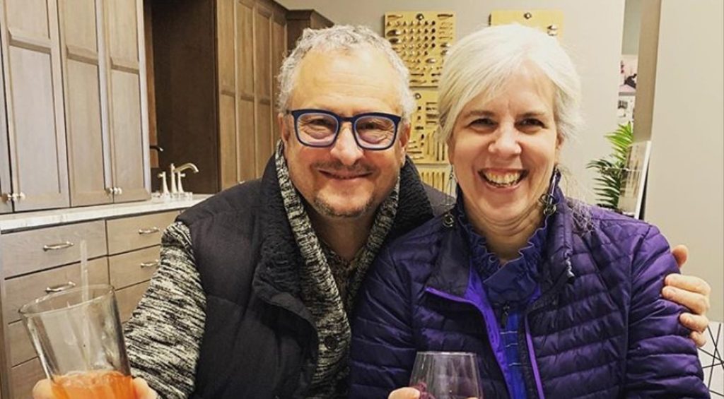 happy man and woman in Cleary's design center working on design-build renovation